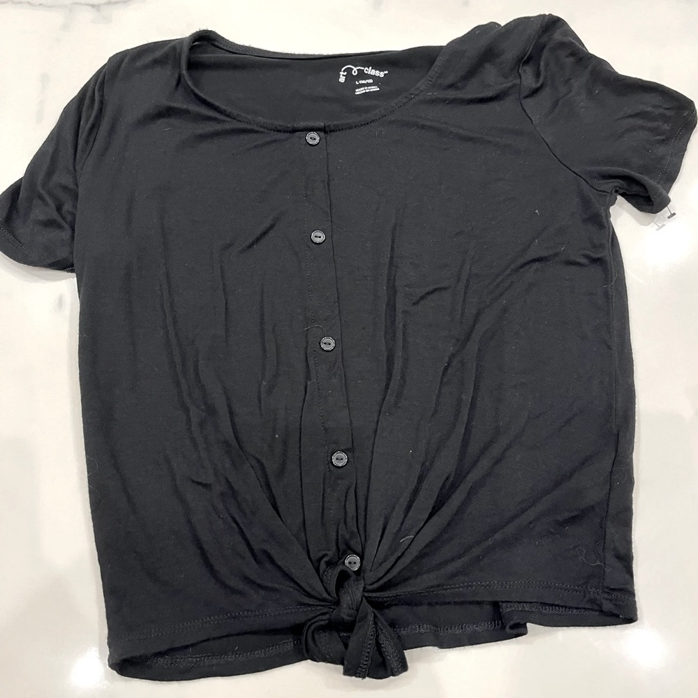 Black top with Decorative buttons and tie!